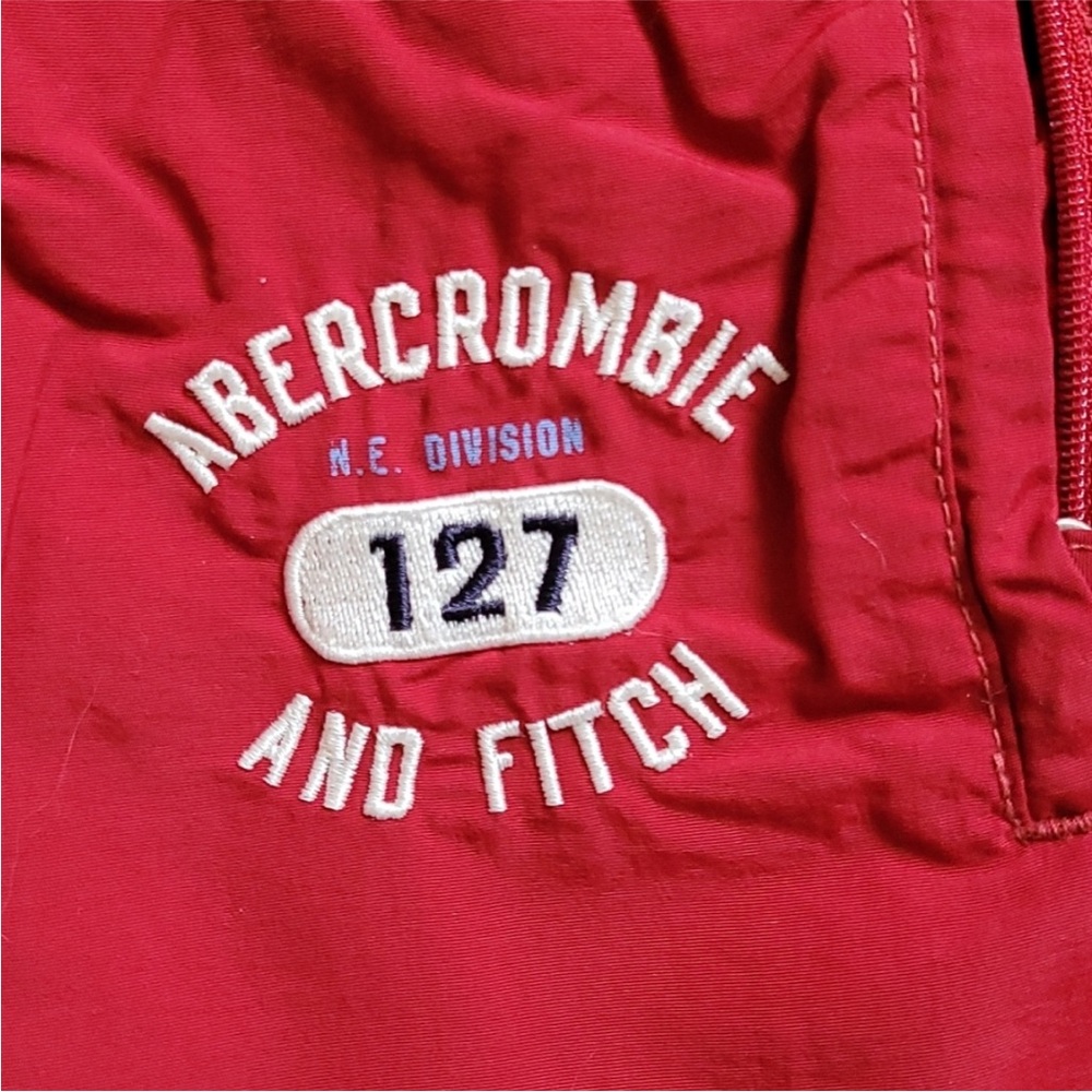 Abercrombie & Fitch athletic track pants. Small. Wear on back hem of legs